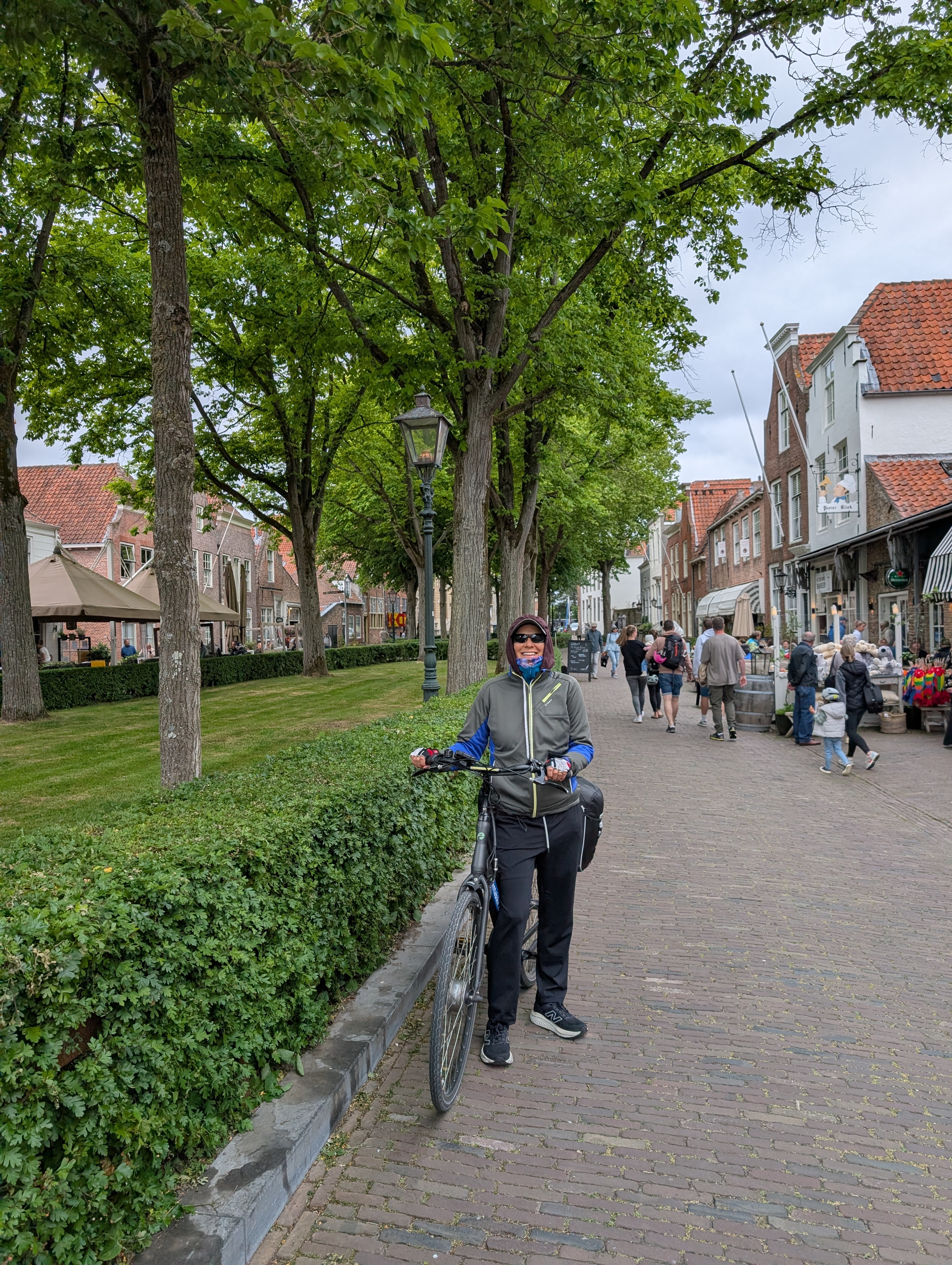 Kari with bike on Veere's main street
