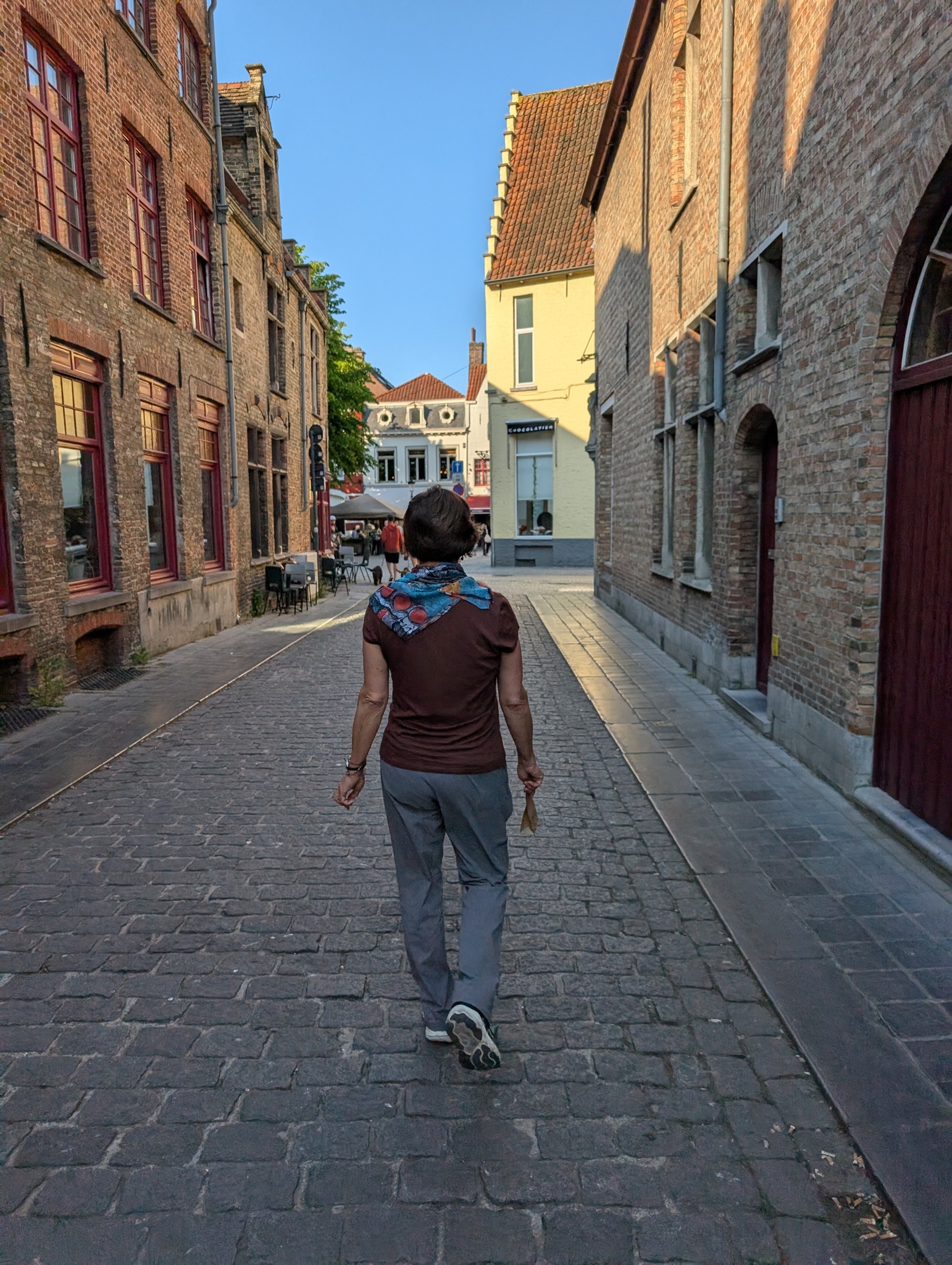Kari walking in Bruges