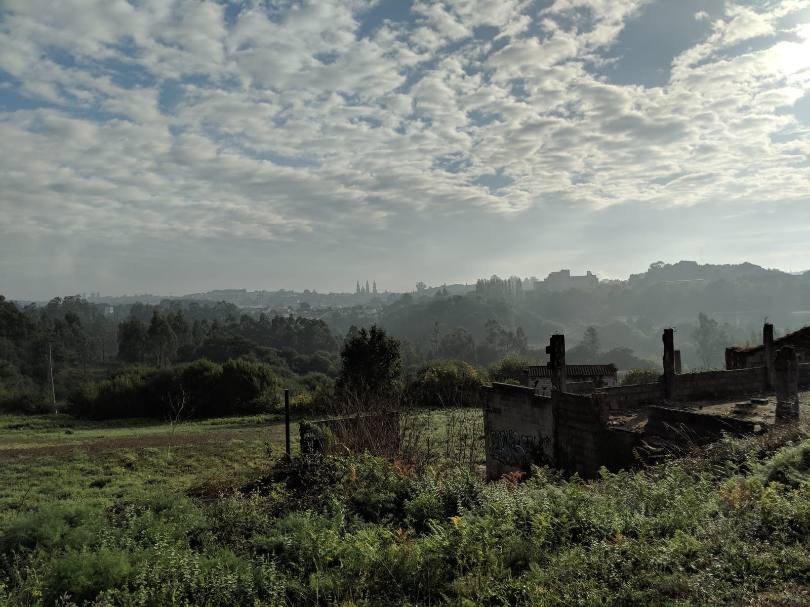 Looking back at Santiago in the distance, its cathedral spires on the horizon