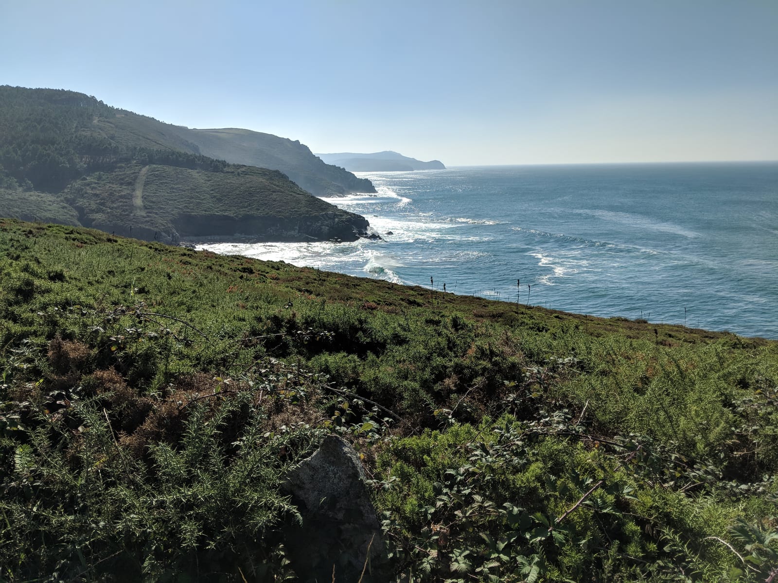 Rugged coastline and headlands over a sparkling sea