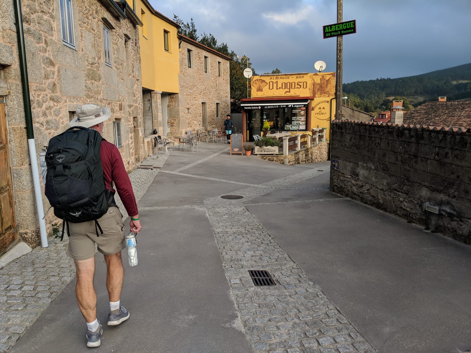 Mike passing the Albergue-Bar O Logoso