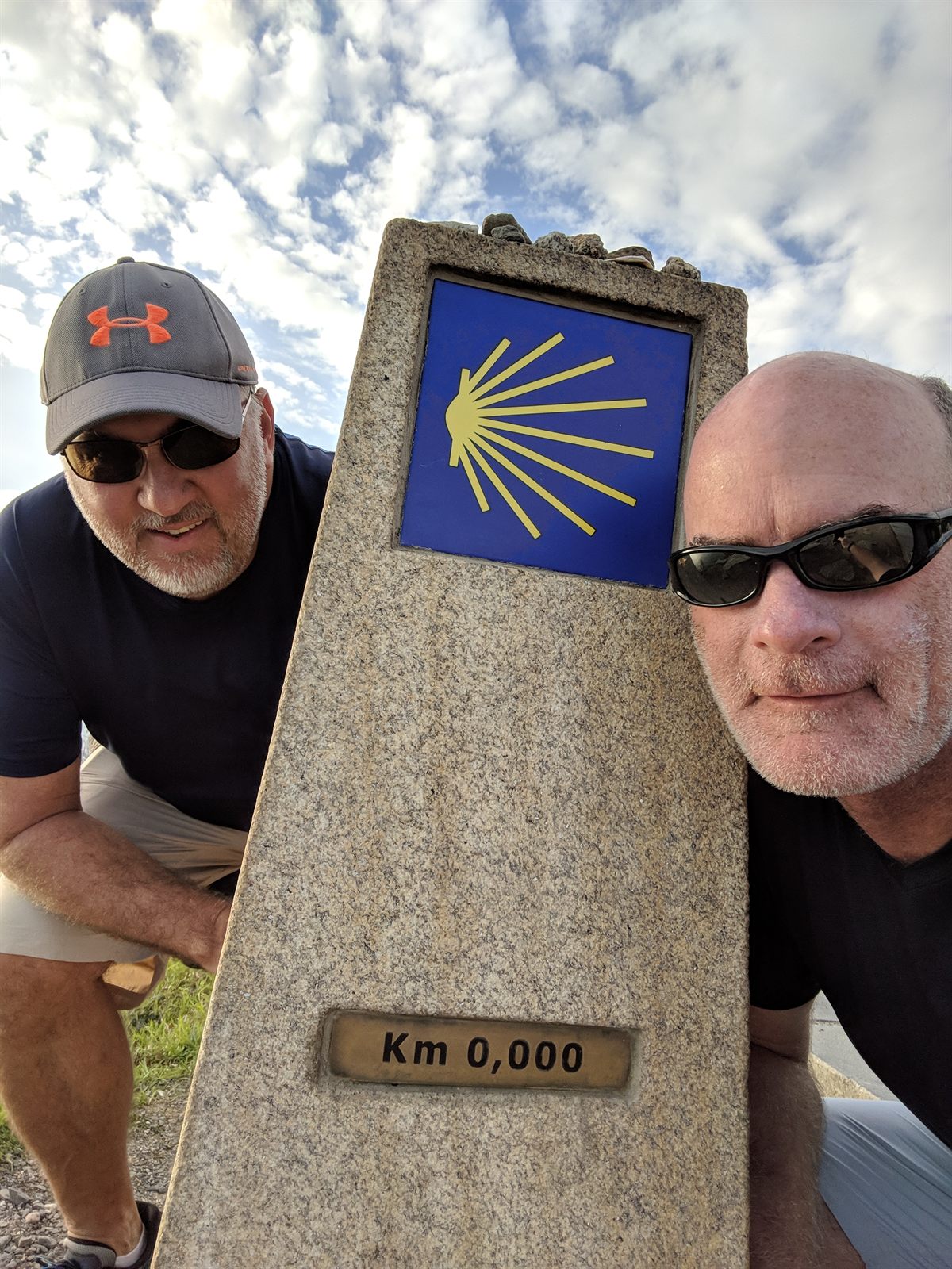 Mike and Doug at the Km 0 marker at Finisterre, the end of the Camino de Santiago