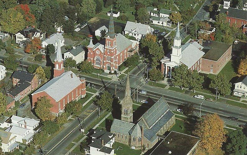 Four churches at the intersection in Palmyra — found this photo online for reference