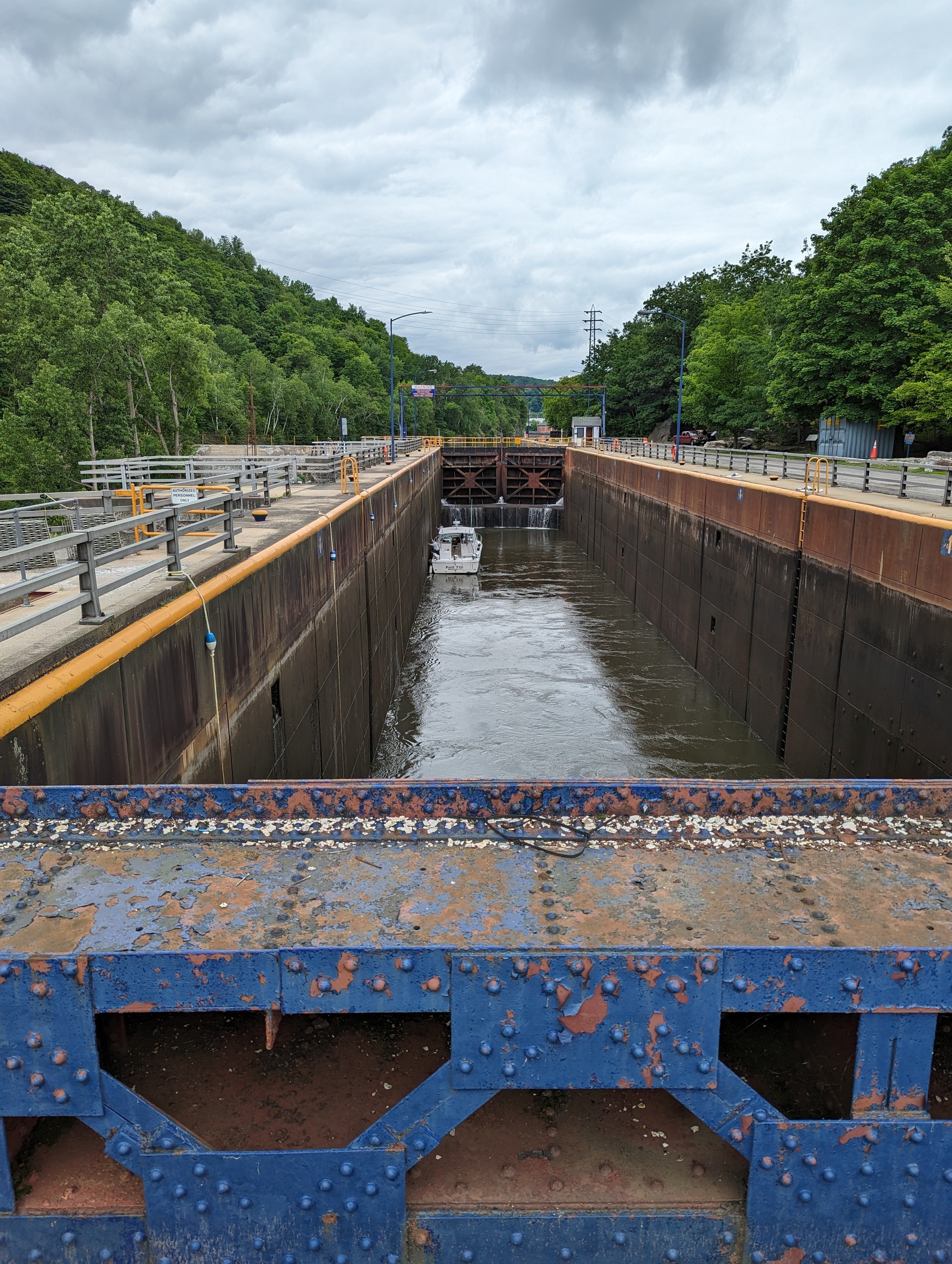Small boat using the tallest lock on the Erie Canal in Little Falls