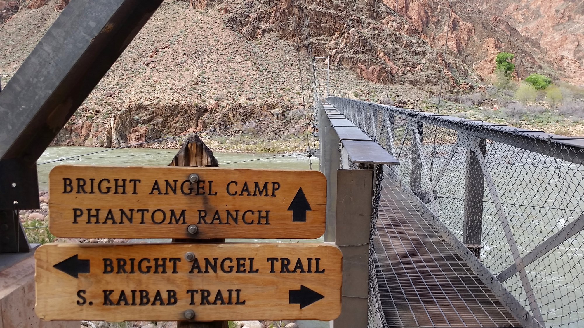 Bright Angel Camp and Phantom Ranch signs at the Colorado River bridge