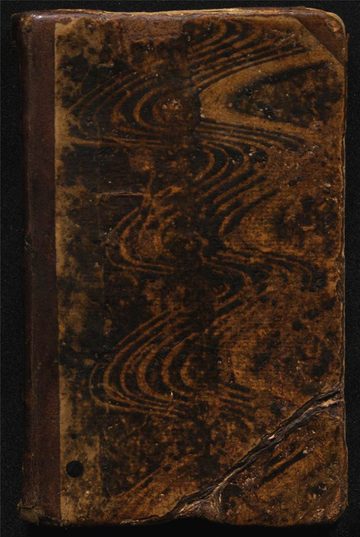 The worn marbled-leather cover of Henry Vanderslice's wagon-master journal