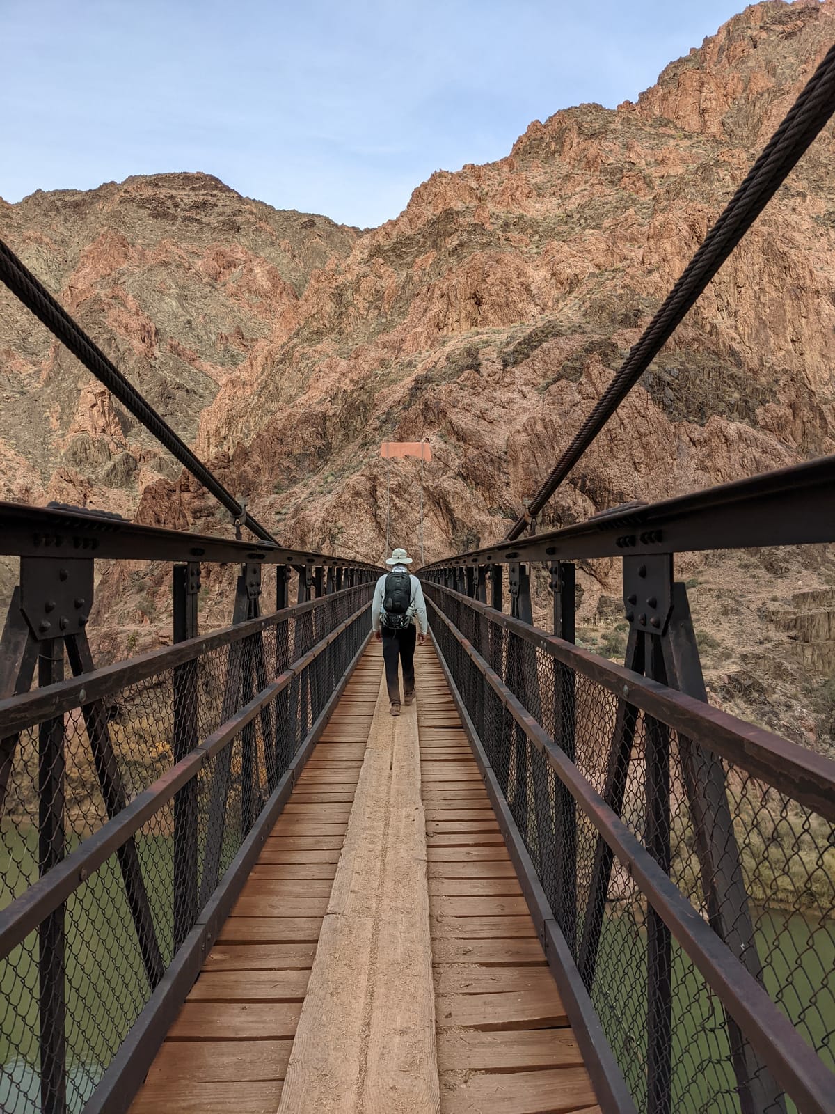 Doug crossing the Black Bridge, the Kaibab Suspension Bridge, over the Colorado River