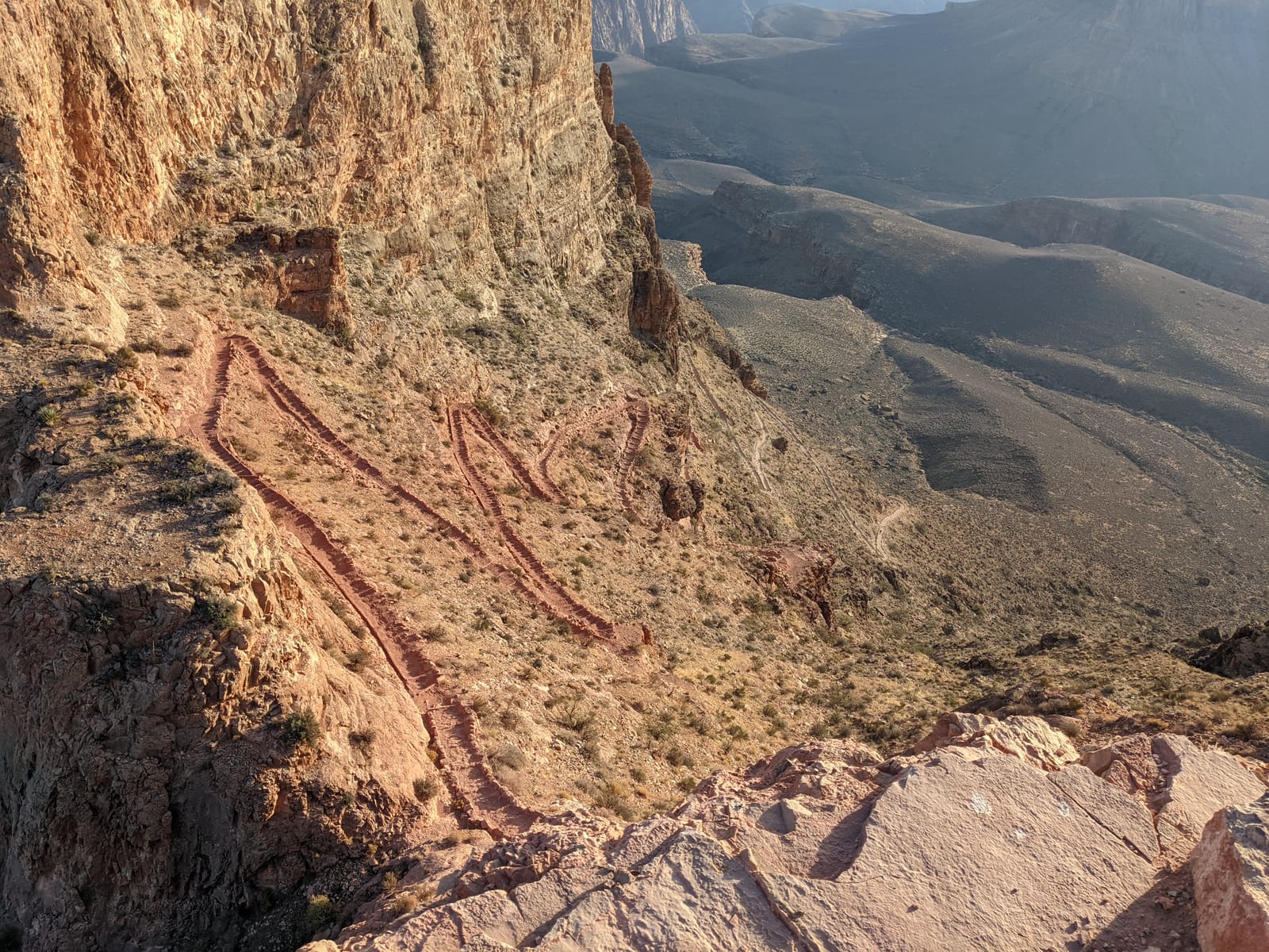 Steep switchbacks carved into the red rock of the South Kaibab Trail