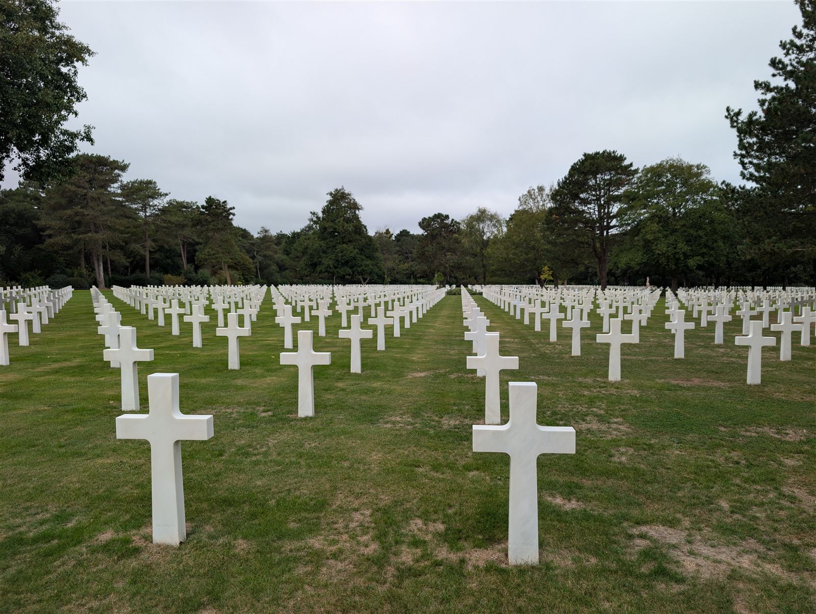 Rows of white marble crosses at the Normandy American Cemetery above Omaha Beach